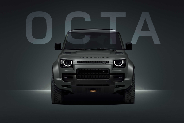 Front view of the black Defender parked, with 'OCTA' text overlaid.