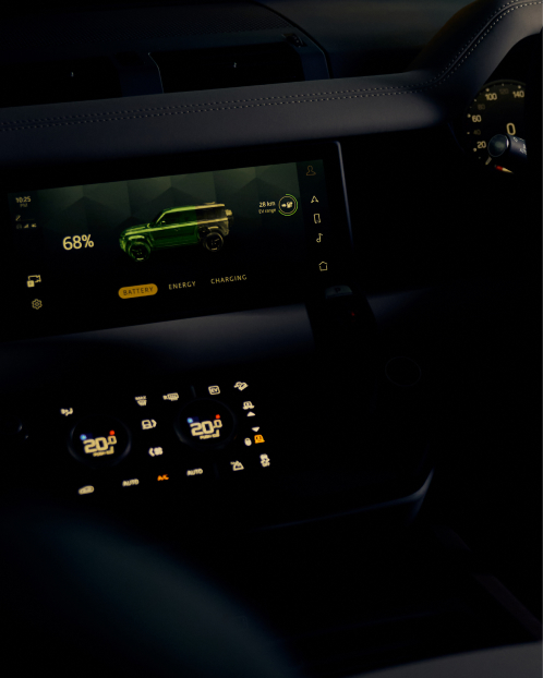 Close-up of the Defender interior infotainment console, showing vehicle battery life.