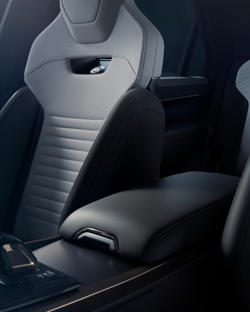 Close-up of the Range Rover interior console and duo-tone seats.
