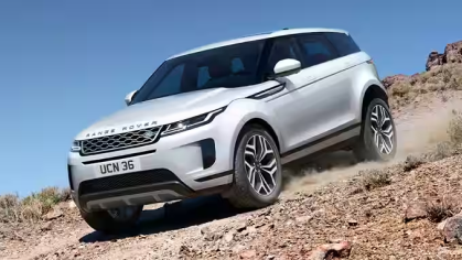 Range Rover Evoque driving up a trail