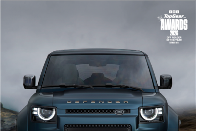 Front view of the black Defender parked, with 'OCTA' text overlaid.